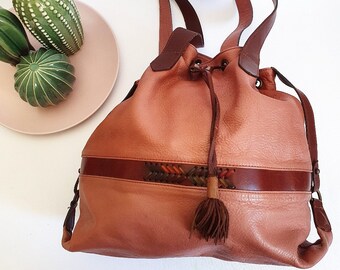 Made in Italy shoulder bucket bag in real antique pink leather and interior lined with paisley patterned fabric