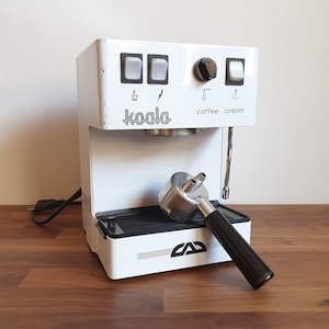 Electric machine for Italian espresso and cappuccino, vintage coffee maker from the 80s and 90s made in Italy Koala Coffee Cream