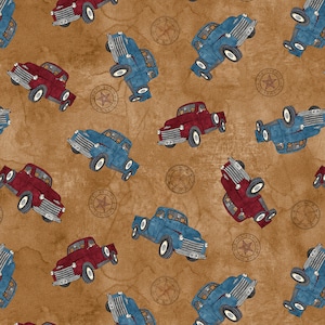 My Hero Wears Cowboy Boots 1985-35 Fawn Tossed Trucks. Priced by the half yard.