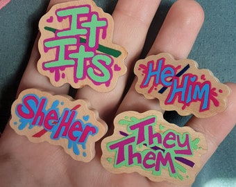 1.5" Paint Splatter Wood Pronoun Pins