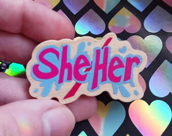 2" She/Her Paint Splatter Wood Pronoun Pin