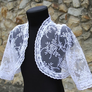 Elegante bolero voor meisjes: cape voor meisjes eerste communie, witte kanten gebreide blouse voor meisjes, schouderophalend.