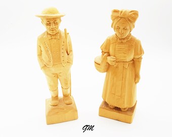 vintage hand-carved wooden figure, handicraft, figures man and woman, peasant motif,