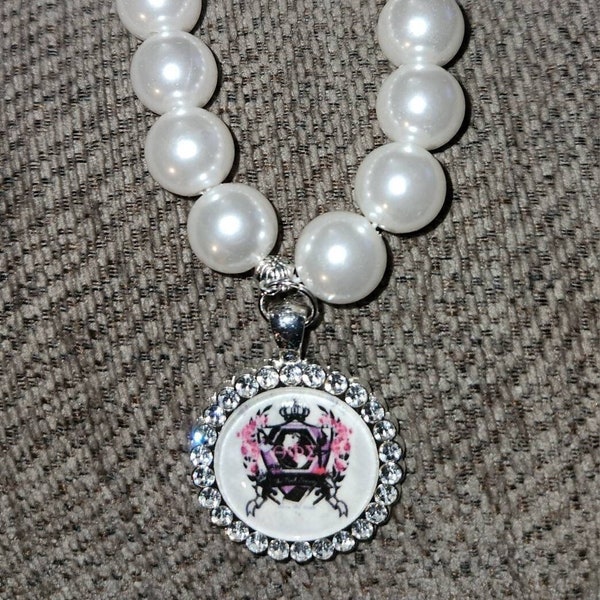 Theta Phi Sigma Crest in a Rhinestone Bezel Pendant Pearl Bracelet, necklace, or pendant only.