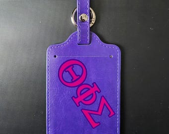 Theta Phi-Sigma-Gepäckanhänger