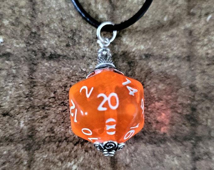 D20 Necklace comes with small dice bag translucent neon orange D20 on 16 inch black leather cord w lobster claw closure