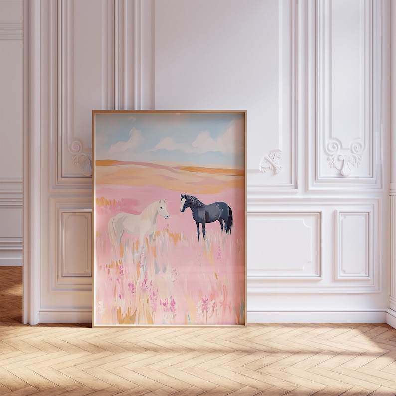 May include: A painting of two horses in a field of pink flowers. The horse on the left is white and the horse on the right is black. The sky is blue with white clouds.