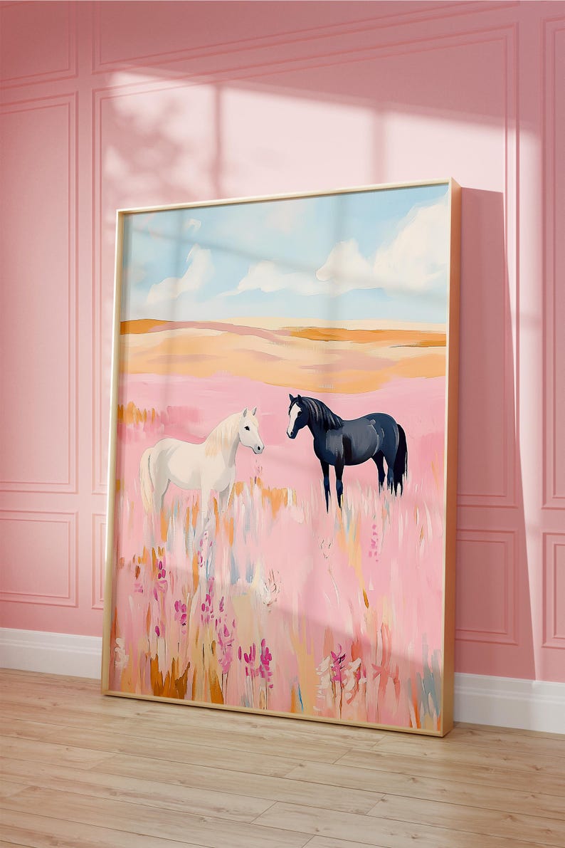 May include: A painting of two horses in a field of pink flowers. The horse on the left is white and the horse on the right is black. The sky is blue with white clouds.