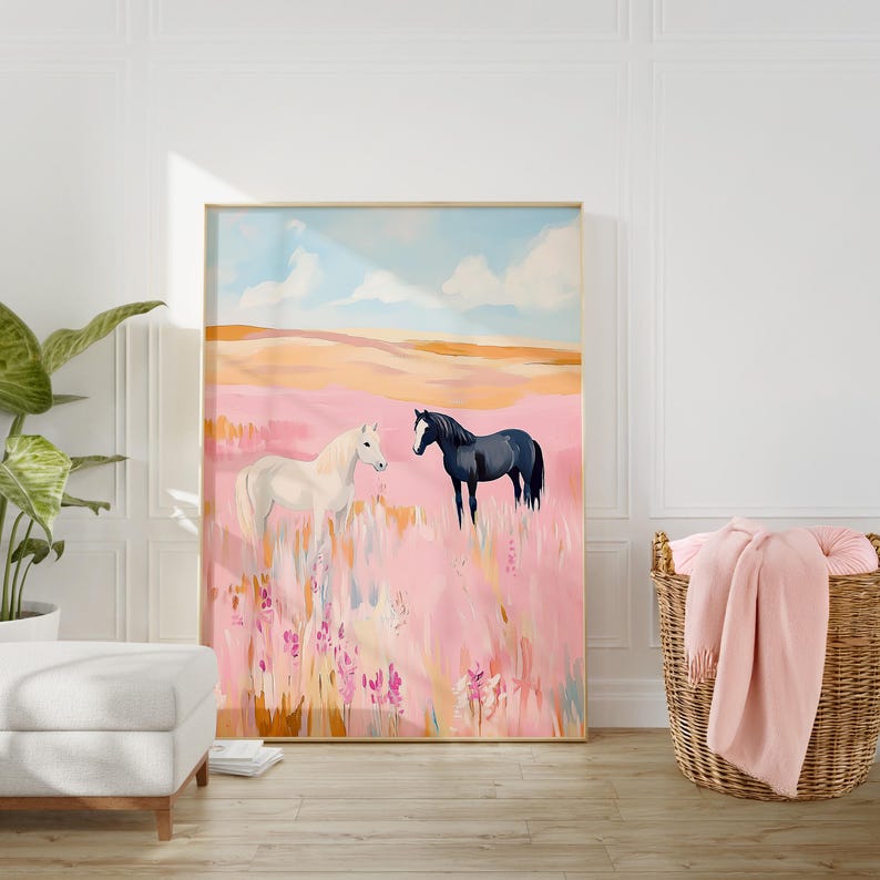 May include: A painting of two horses in a field of pink flowers. The horse on the left is white and the horse on the right is black. The sky is blue with white clouds.