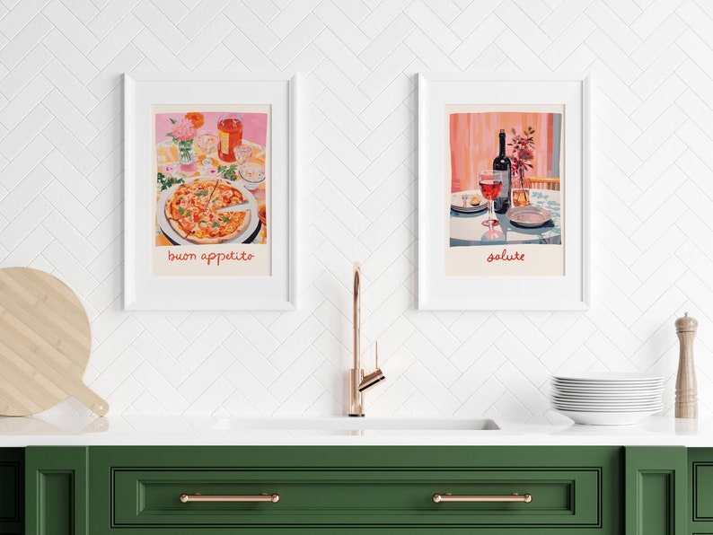 May include: Two framed illustrations of a table setting. The first illustration shows a pizza with the text "buon appetito". The second illustration shows a glass of wine and a bottle of wine with the text "salute".