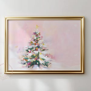 Puede incluir: Pintura enmarcada de un árbol de Navidad con marco dorado. El árbol está pintado con una variedad de colores, incluyendo blanco, verde, rosa y amarillo. Una estrella dorada está en la parte superior del árbol. El fondo es rosa pálido.