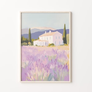 Close-up of a framed painting featuring a pale villa set against distant hills, surrounded by blooming lavender. The pastel color palette and expressive brushwork evoke a dreamy, sunlit countryside.