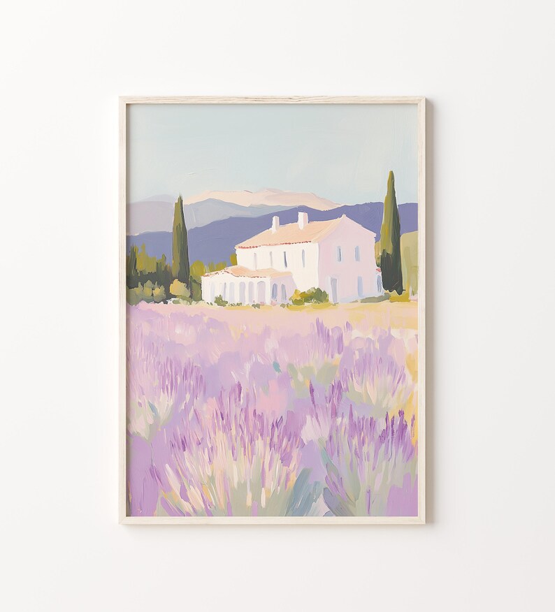 Close-up of a framed painting featuring a pale villa set against distant hills, surrounded by blooming lavender. The pastel color palette and expressive brushwork evoke a dreamy, sunlit countryside.