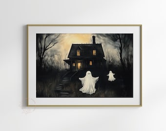 May include: A framed print of a spooky Halloween scene. A dark, two-story house with lit windows sits in a shadowy forest. Two white ghosts float in front of the house. The artwork is framed in a gold-colored frame.