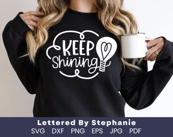 Keep shining SVG cut file encouragement quote uplifting svg shine bright lightbulb svg lettered by stephanie cricut craft cut files
