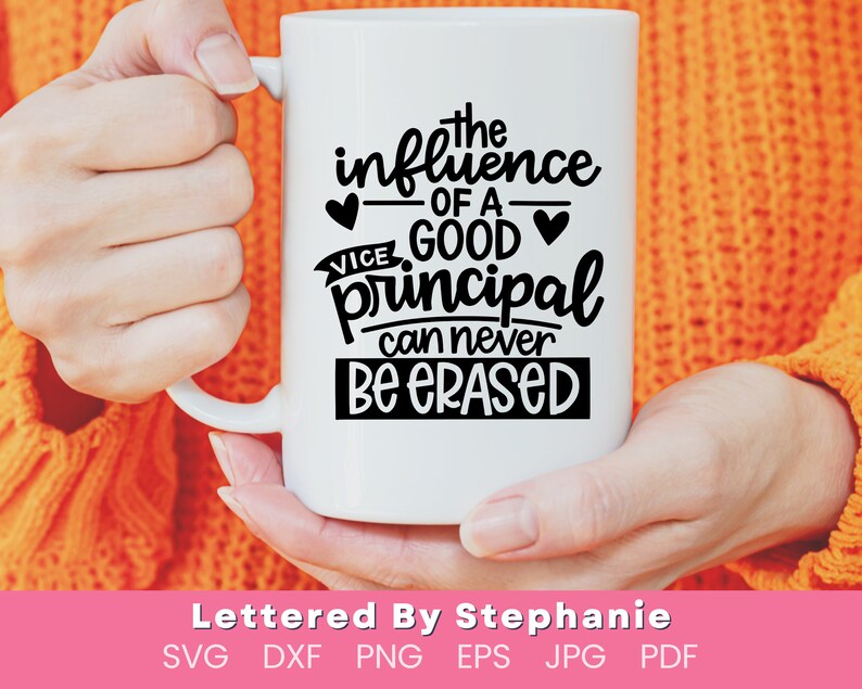 May include: White ceramic mug with black text that reads "The influence of a good principal can never be erased". The mug is held by a person's hands.