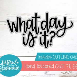 May include: Black and white hand-lettered text on a wood background that reads "What day is it?"  Includes Outline SVG. Lettered by Stephanie. Hand-lettered cut files.