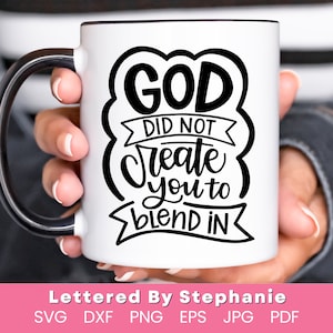May include: White coffee mug with a black handle. The mug has a black and white graphic that says "GOD DID NOT CREATE YOU TO BLEND IN".