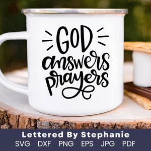 May include: White enamel mug with a silver rim and a black script that reads "GOD answers PRAYERS." The mug is on a wooden surface with a s'more. The text "Lettered By Stephanie" is at the bottom, along with file type icons.