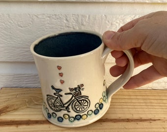 Handmade Pottery 12 oz Bicycle Mug with Bird, Flowers and Mini Hearts, Illustrated Pottery Tea Cup, Hand Painted for Nature & Outdoor Lovers