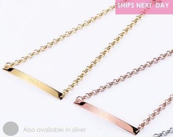 May include: Three gold, rose gold, and silver bar bracelets with a chain link design. The bar is engraved with the text "R&A" and "40.7128° N 74.00609° W". The bracelets are available in silver. SparkleXO.com