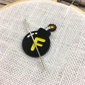 F Bomb Needle Minder | Naughty F word needle magnet | Black Round f-bomb magnetic needle holder |  Snarky Dropping F Bombs Needleminder