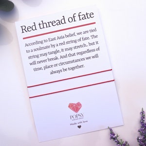 May include: Red thread of fate bracelet with a white card that reads "According to East Asia belief, we are tied to a soulmate by a red string of fate. The string may tangle, it may stretch... but it will never break. And that regardless of time, place or circumstances we will always be together." The card also has a red heart with the word "POPSY" on it.