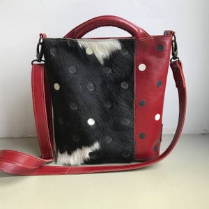 Leather shopper with short handles and long adjustable strap