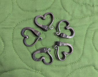 Horseshoe nail hearts