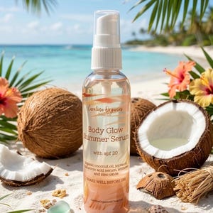 May include: A clear bottle of Body Glow Shimmer Serum with SPF 20 from Carolina Organics Soap Co. is displayed on a sandy beach. The bottle is surrounded by coconuts, flowers, and seashells. The text on the bottle reads "SHAKE WELL BEFORE USE."