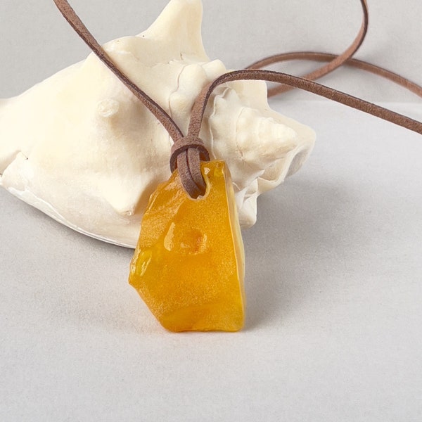 Natural Baltic Amber pendant, bright honey color, natural shape, suede cord, eco-style jewelry