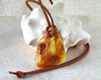 Natural Baltic Amber Pendant, bright solid amber with a rare texture, suede cord, eco-style jewelry