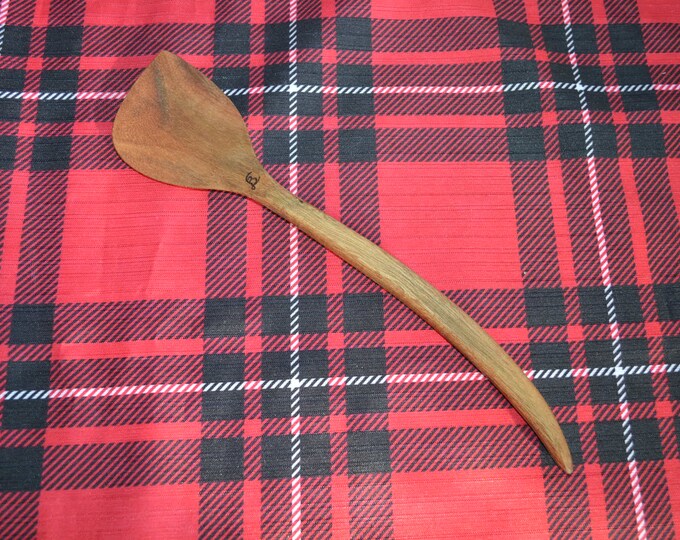 handmade wooden spurtle kitchen utensil of Acacia wood for stirring and mixing