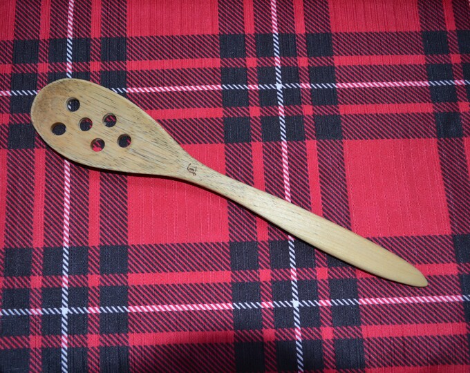 Large colander spoon.