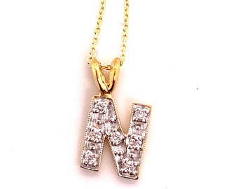 Initial on Two Tone Yellow and White Gold Pendant with Diamonds