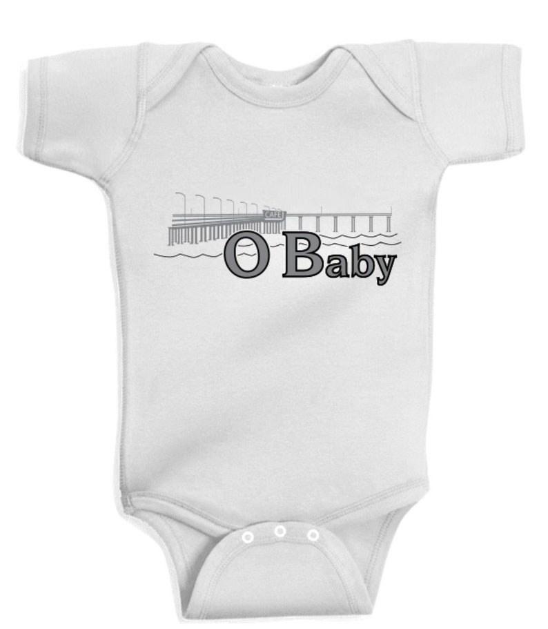 Ocean Beach OB Baby one piece body suit that says OBaby image 1