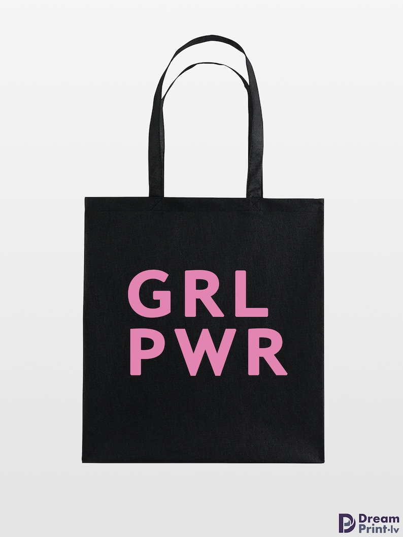 May include: Black tote bag with the pink text "GRL PWR". The bag has two black handles and is made of a sturdy material. The design is simple and bold, making it a statement piece.