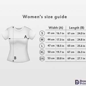 May include: Women's size guide chart with measurements in inches and centimeters for sizes S, M, L, XL, and 2XL. The chart shows the width and length of a t-shirt.