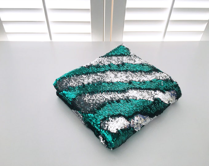 Emerald green/silver reversible sequins weighted lap pad