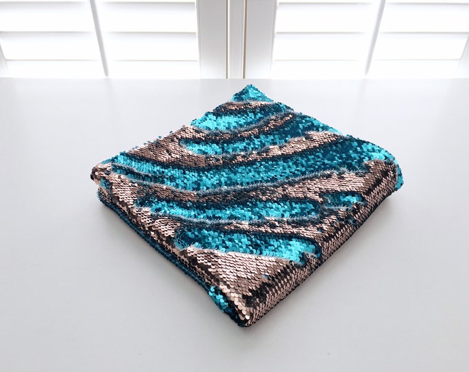 Rose gold/turquoise reversible sequins weighted lap pad