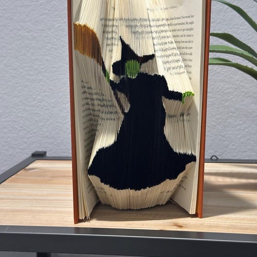 Hand Folded Book Art – Wicked Witch Silhouette Halloween Decor, Book Lover Gift (Paper Anniversary)
