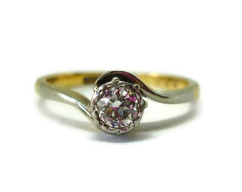 Brilliant cut bezel set diamond solitaire crossover ring, platinum and gold, mixed metal dainty engagement ring, size 4.5