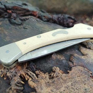 Navaja plegable de acero Frontier vintage: herramienta de bolsillo estadounidense