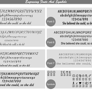 May include: A chart titled Engraving Fonts And Symbols displaying seven distinct font styles labeled Font 1 through Font 7. Each font shows uppercase letters, lowercase letters, numbers 0-9, and the phrase She believed she could, so she did.
