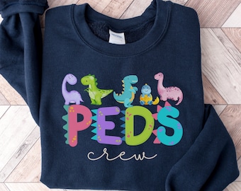 PEDS Crew Sweatshirt Pediatric Nurse Dinosaur Shirt Bright Fun Crewneck Sweater for New Nurse Graduate RN Tech Group Shirt