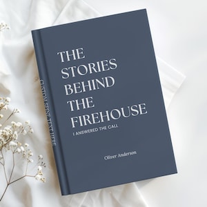 May include: A dark blue hardcover book titled The Stories Behind The Firehouse I Answered The Call by Oliver Anderson. The spine features the text Custom Spine Text Here. The book cover has white serif typography against a solid dark blue background.