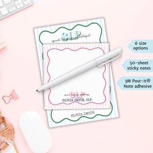 May include: A stack of sticky notes with a white pen. The notes have a pink and white striped pattern and a green and blue striped border. The text "speech language pathologist" and "OLIVIA SMITH, SLP" are printed on the notes.