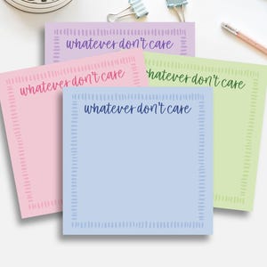 May include: A white ceramic mug with a black handle and the text "But First, Coffee" in a black, bold font. The mug is sitting on a wooden surface. The mug is approximately 4 inches tall.