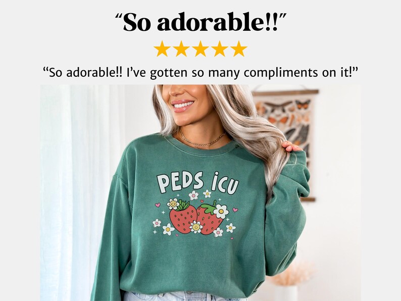May include: Green sweatshirt with a graphic of two strawberries and the text "PEDS ICU" in white.