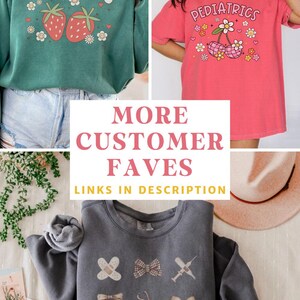 May include: Three different t-shirts with a pediatric theme. The first shirt is green with strawberries and the text "PEDIATRICS". The second shirt is pink with cherries and the text "PEDIATRICS". The third shirt is gray with a variety of medical symbols and the text "MORE CUSTOMER FAVES LINKS IN DESCRIPTION".